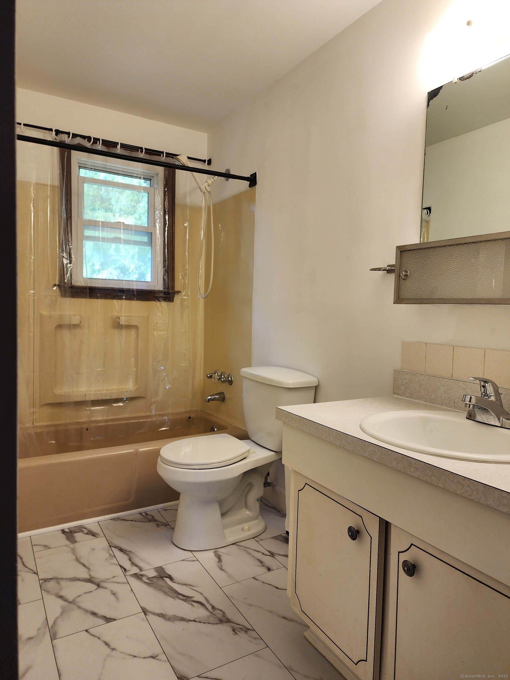 195 Wall Street Hebron, CT 06248 - Photo 8 of 12 a bathroom with a sink a toilet and shower