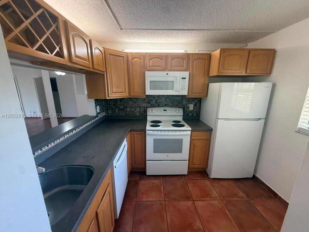 3399 Foxcroft Road, Unit 104 Miramar, FL 33025 - Photo 1 of 16