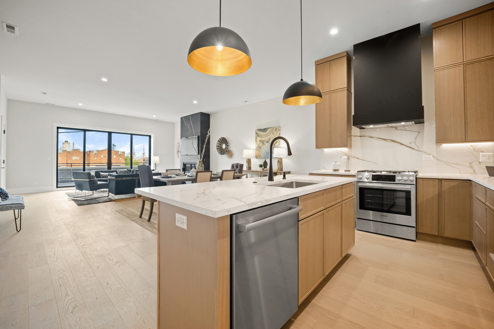 4347 North Richmond Street, Unit 2N Chicago, IL 60618 - Photo 14 of 31 a kitchen with a sink stainless steel appliances and cabinets