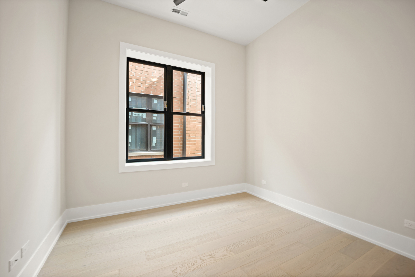 4347 North Richmond Street, Unit 2N Chicago, IL 60618 - Photo 19 of 31 an empty room with a window