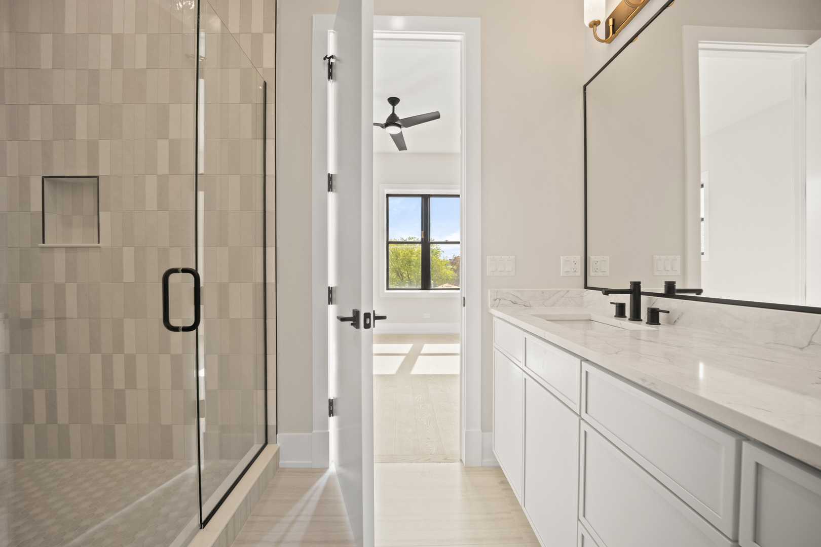 4347 North Richmond Street, Unit 2N Chicago, IL 60618 - Photo 24 of 31 a bathroom with a double vanity sink a mirror and shower