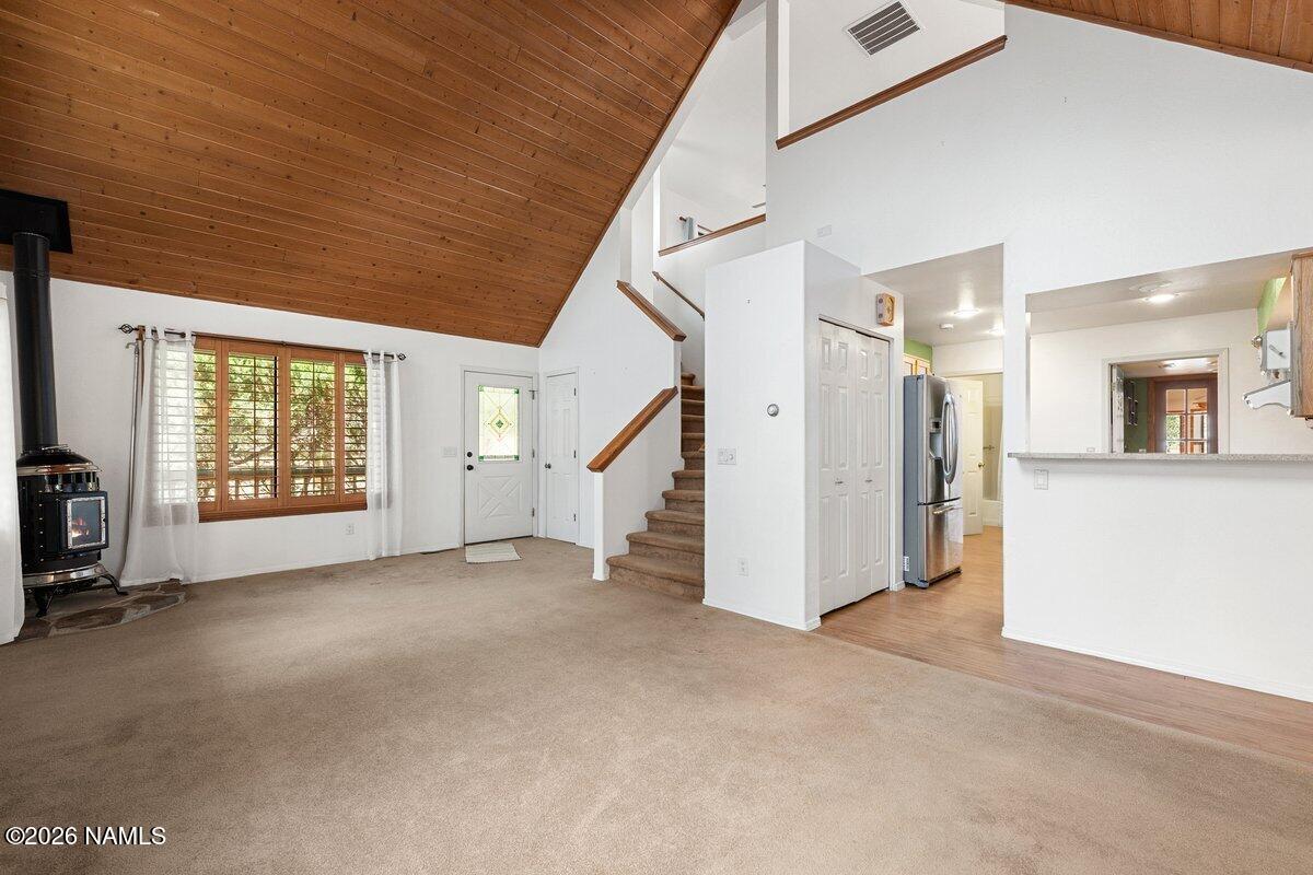 5535 East Western Star Road Flagstaff, AZ 86004 - Photo 8 of 49 a view of a livingroom with a staircase