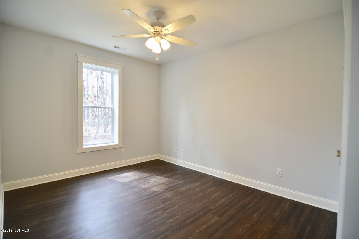 1040 Pierce Road Southport, NC 28461 - Photo 47 of 61 Lower Living Bedroom/office