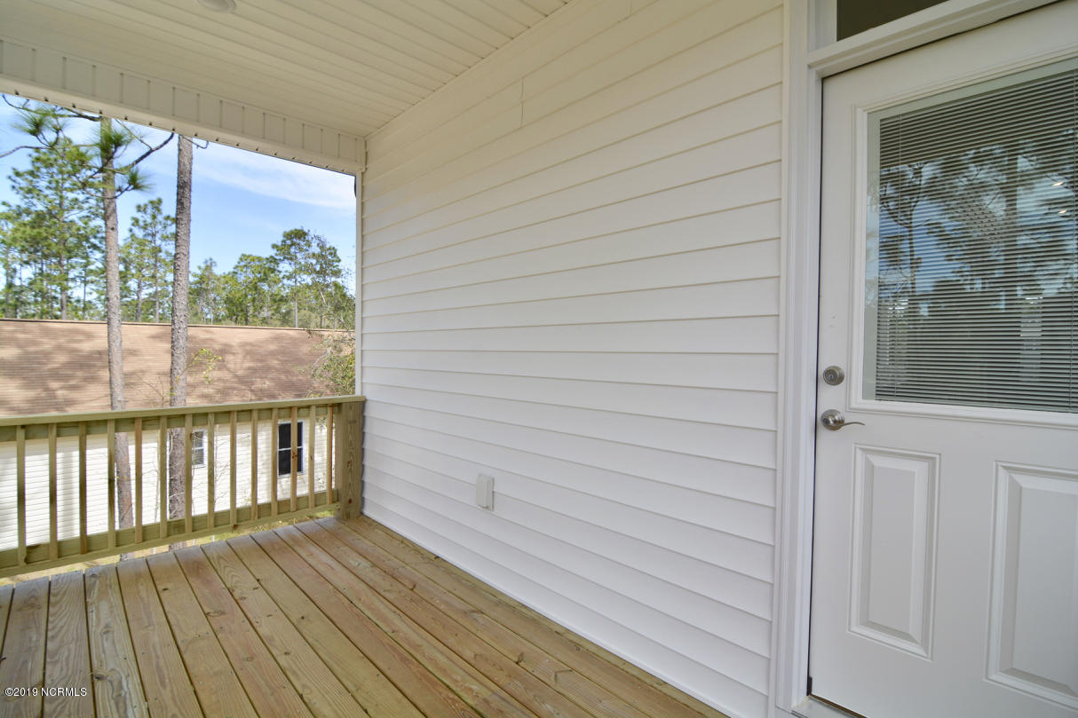 1040 Pierce Road Southport, NC 28461 - Photo 53 of 61 Rear Deck off Kitchen