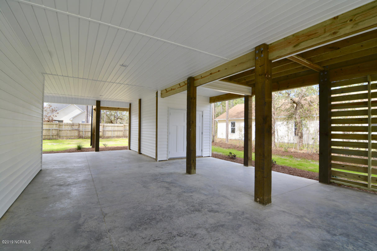 1040 Pierce Road Southport, NC 28461 - Photo 54 of 61 Parking/Outdoor living