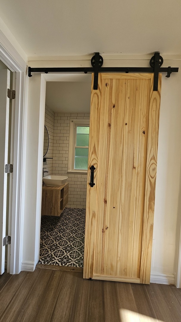 7233 West 85th Street Bridgeview, IL 60455 - Photo 10 of 15 a bathroom with a shower