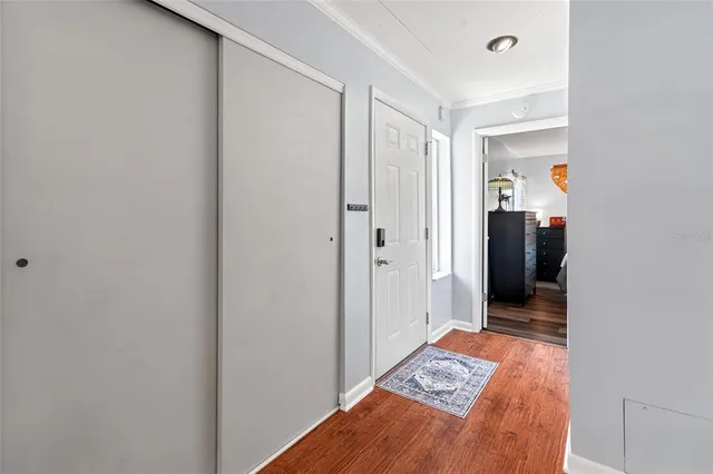a view of hallway with bedroom and bathroom