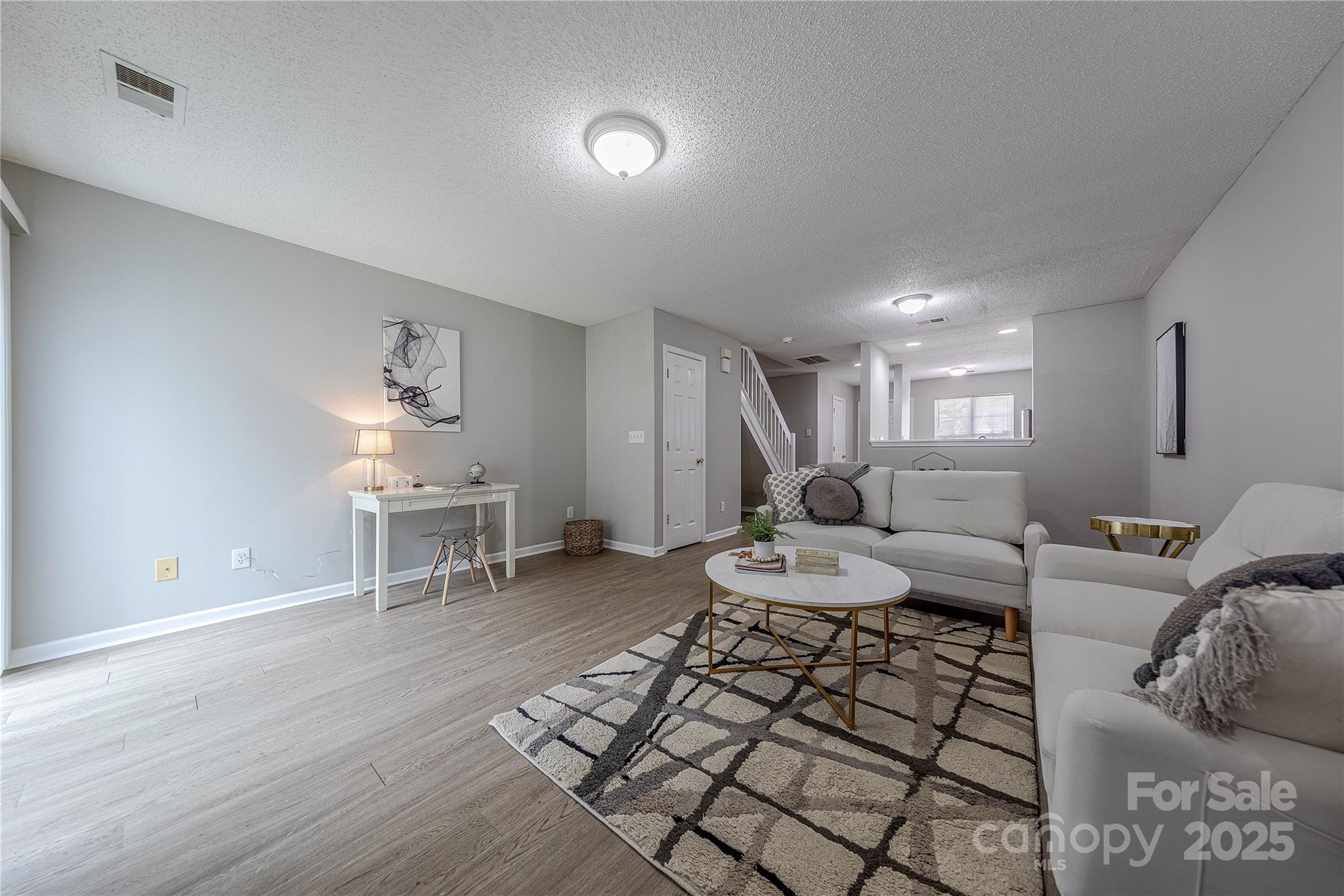 1809 Birch Heights Court Charlotte, NC 28213 - Photo 13 of 23 a living room with furniture and a wooden floor