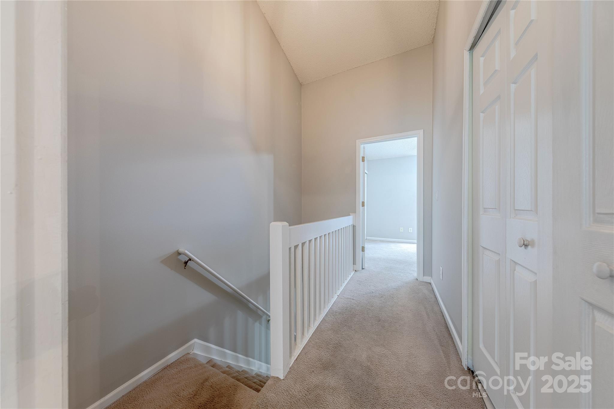 1809 Birch Heights Court Charlotte, NC 28213 - Photo 14 of 23 a view of a hallway with white walls