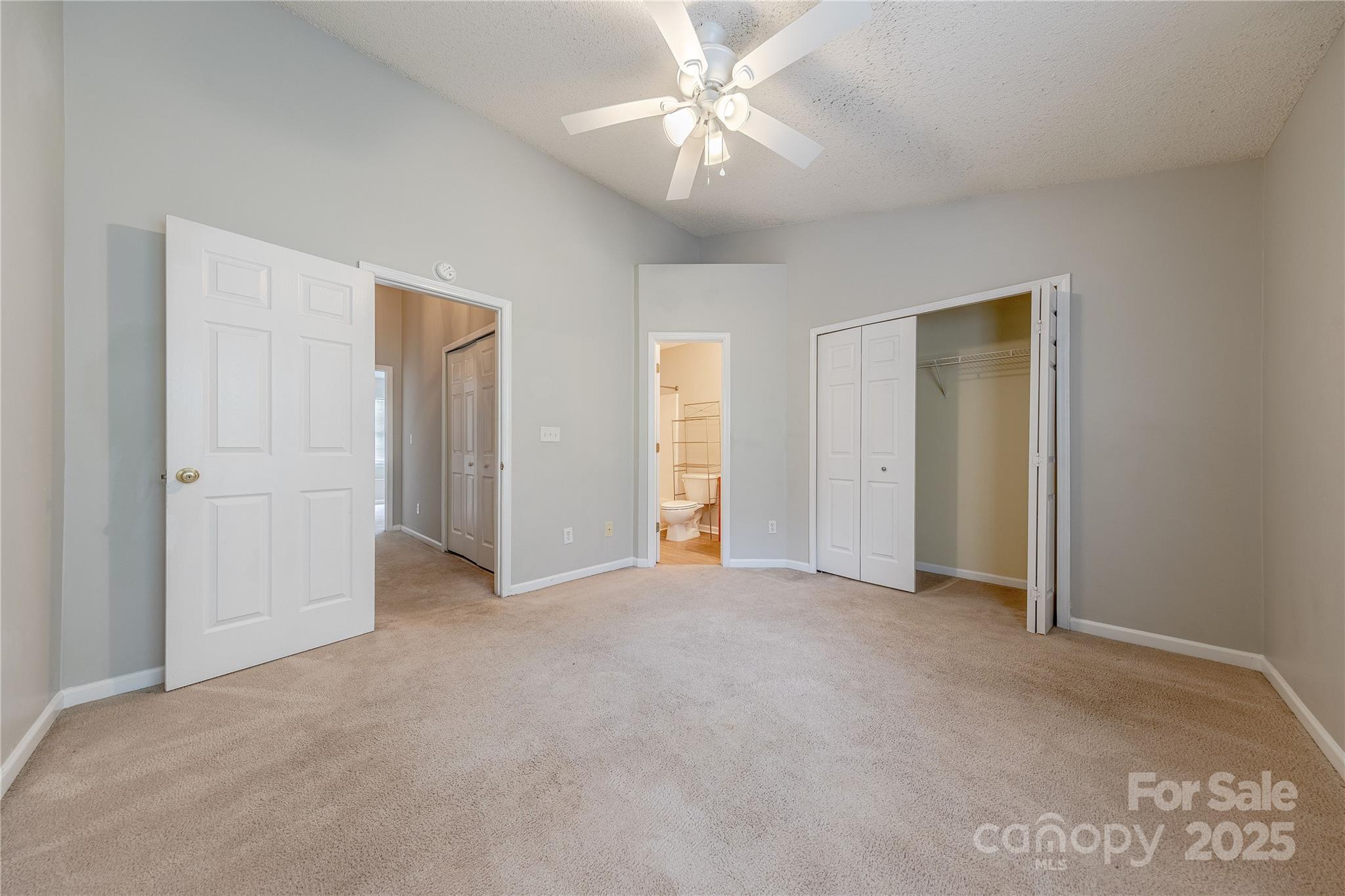 1809 Birch Heights Court Charlotte, NC 28213 - Photo 17 of 23 an empty room with closet and a ceiling fan