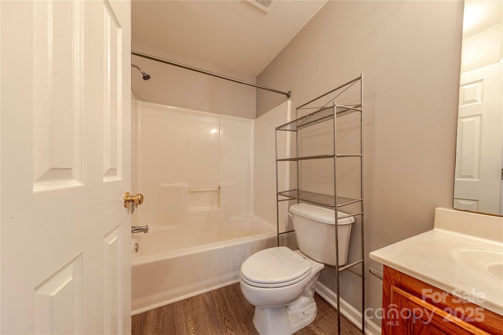 1809 Birch Heights Court Charlotte, NC 28213 - Photo 19 of 23 a bathroom with a toilet and a shower