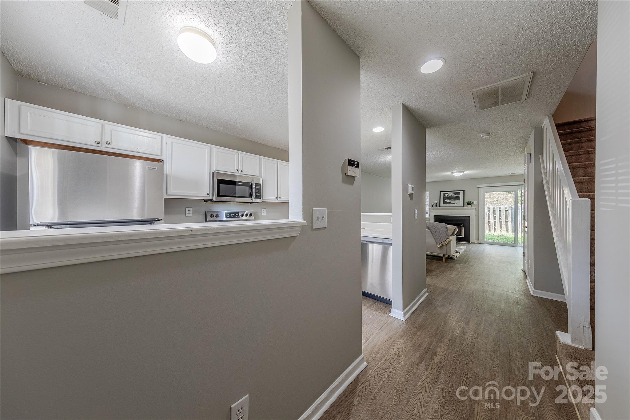 1809 Birch Heights Court Charlotte, NC 28213 - Photo 2 of 23 a view of a kitchen cabinets and wooden floor