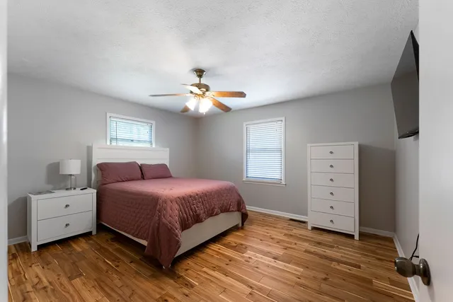 a view of a bathroom from a hallway