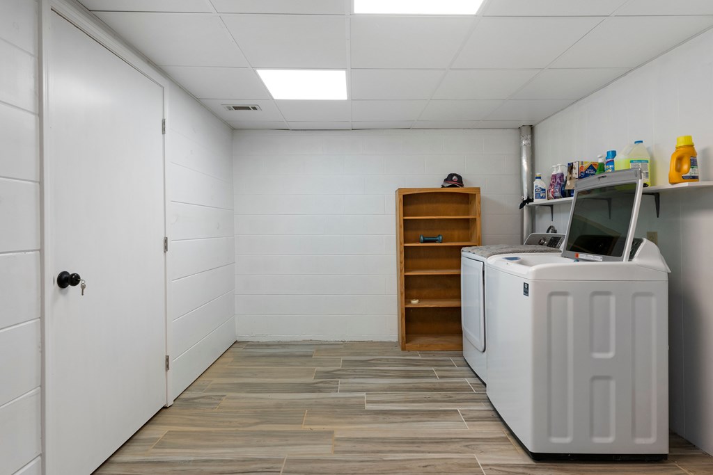 568 Prince Drive Morganton, GA 30560 - Photo 26 of 30 a view of a storage & utility room with washer and dryer