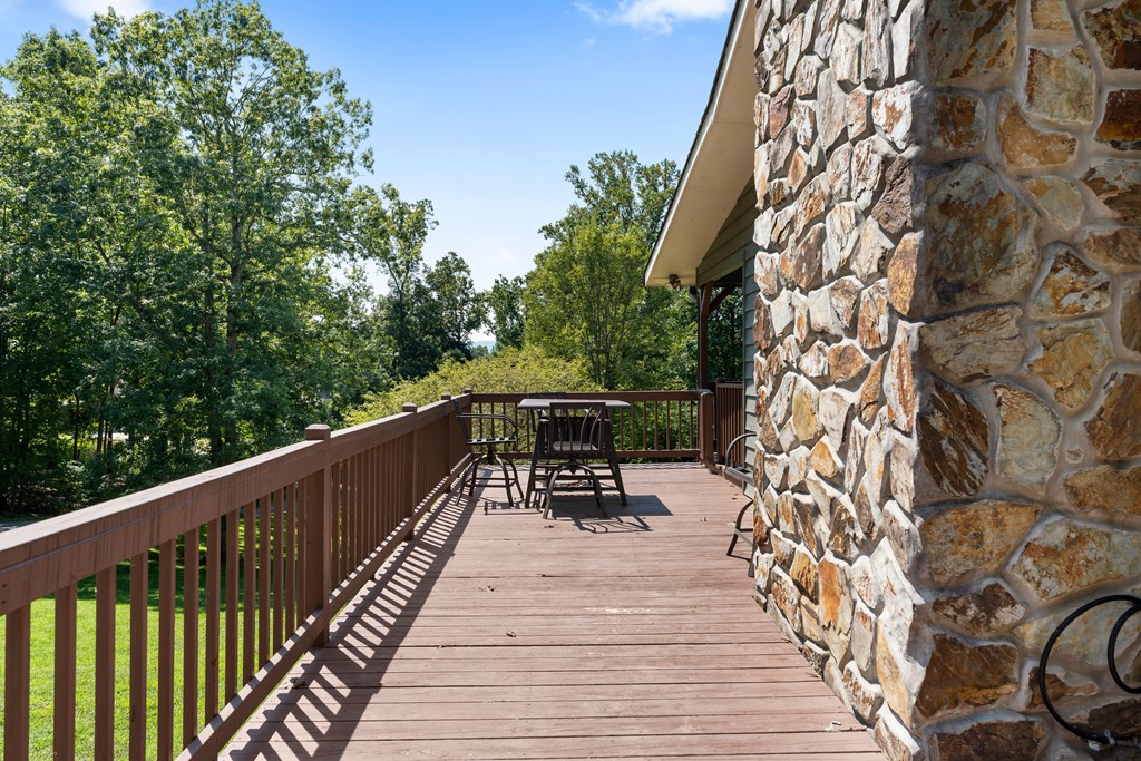 568 Prince Drive Morganton, GA 30560 - Photo 6 of 30 a balcony with wooden floor and outdoor seating
