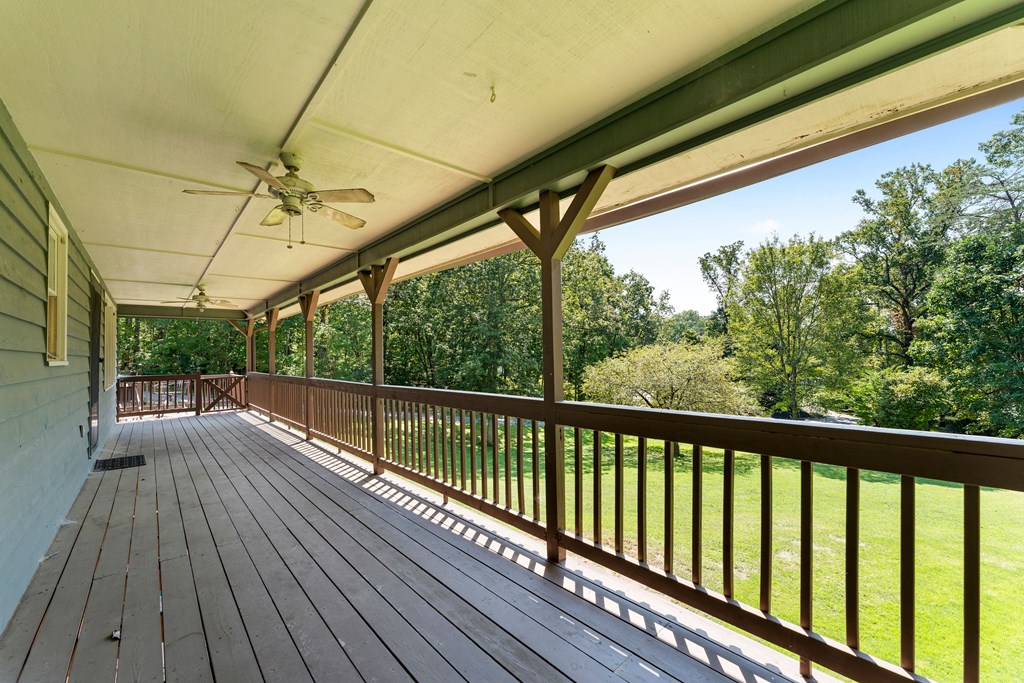 568 Prince Drive Morganton, GA 30560 - Photo 8 of 30 a view of a balcony with wooden floor