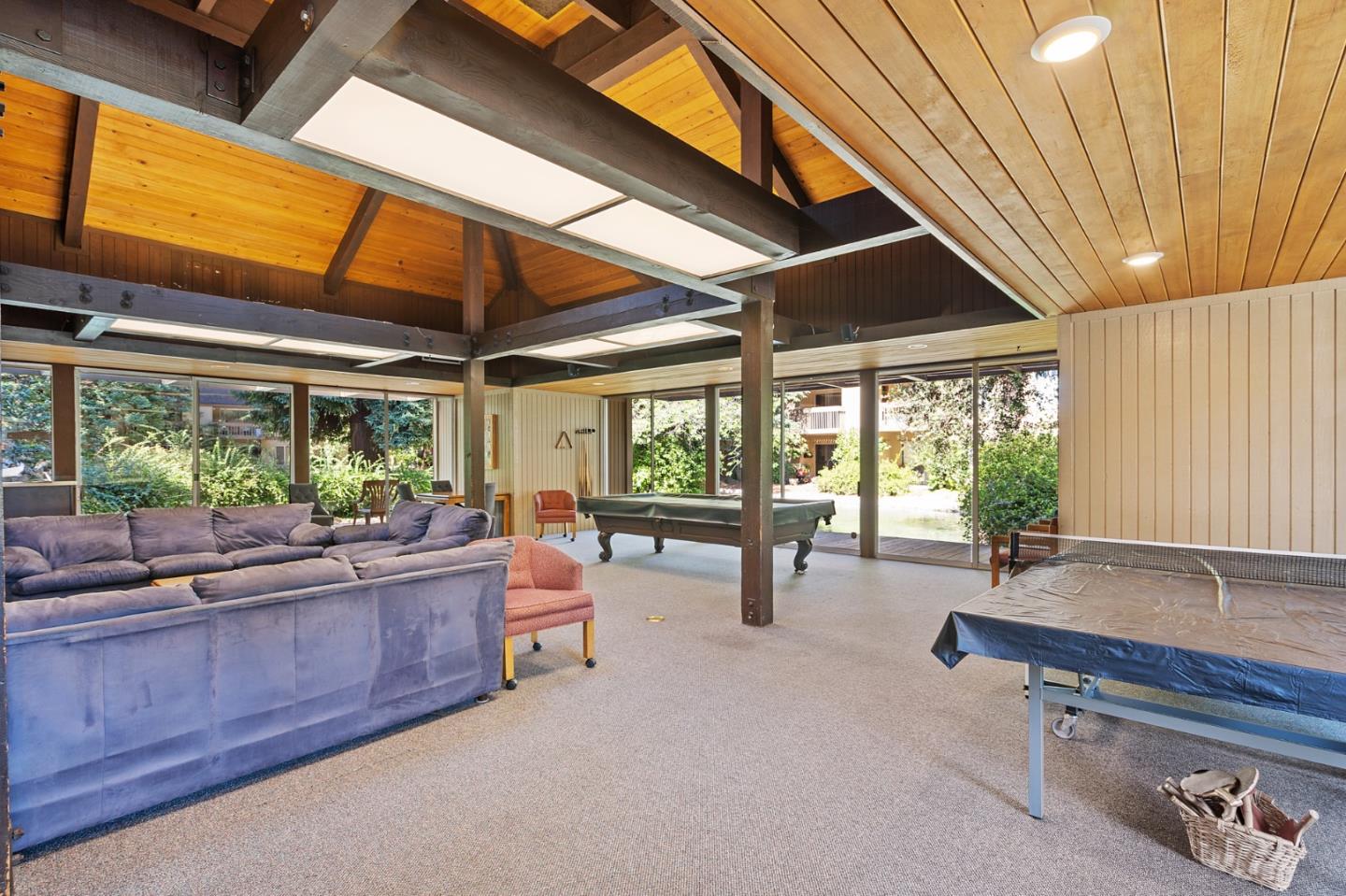 505 Cypress Point Drive, Unit 160 Mountain View, CA 94043 - Photo 14 of 20 a living room with furniture and a large window