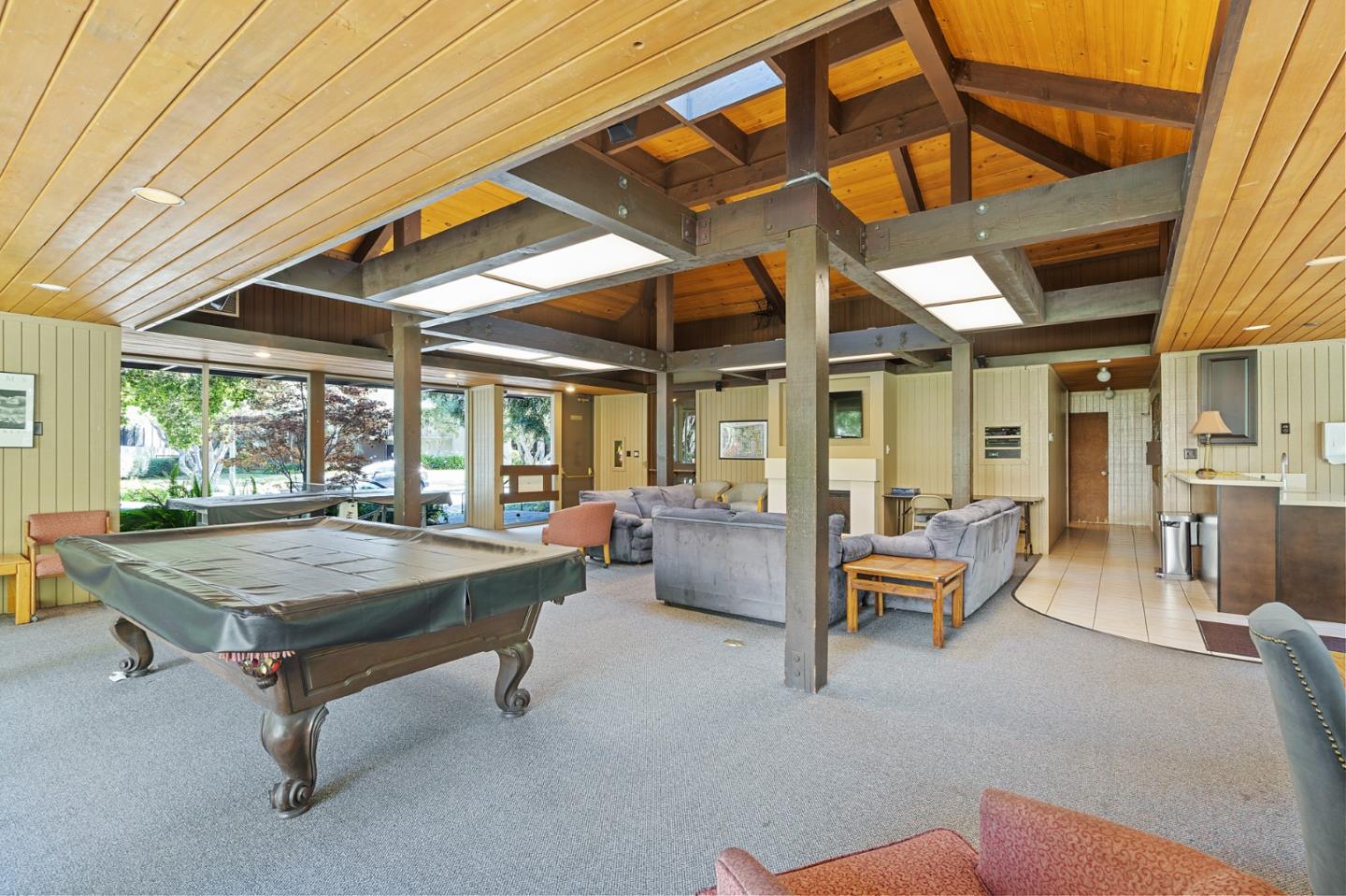 505 Cypress Point Drive, Unit 160 Mountain View, CA 94043 - Photo 15 of 20 a room with pool table and glass windows