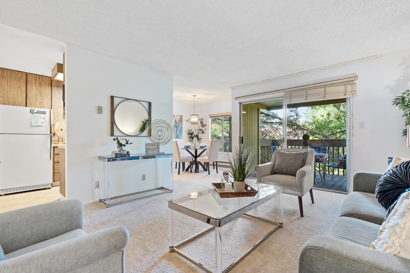 505 Cypress Point Drive, Unit 160 Mountain View, CA 94043 - Photo 2 of 20 a living room with furniture and wooden floor