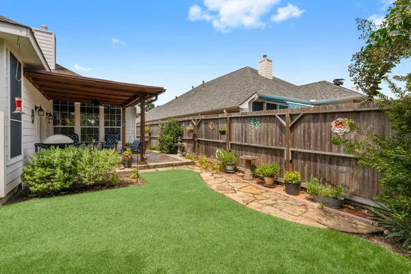 a garden view with a seating space