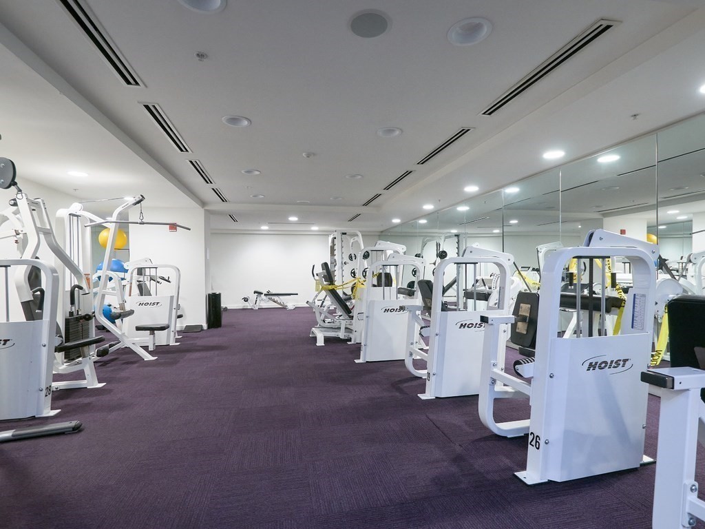 42 8th Street, Unit 5521 Boston, MA 02129 - Photo 17 of 25 a view of a room with gym equipment