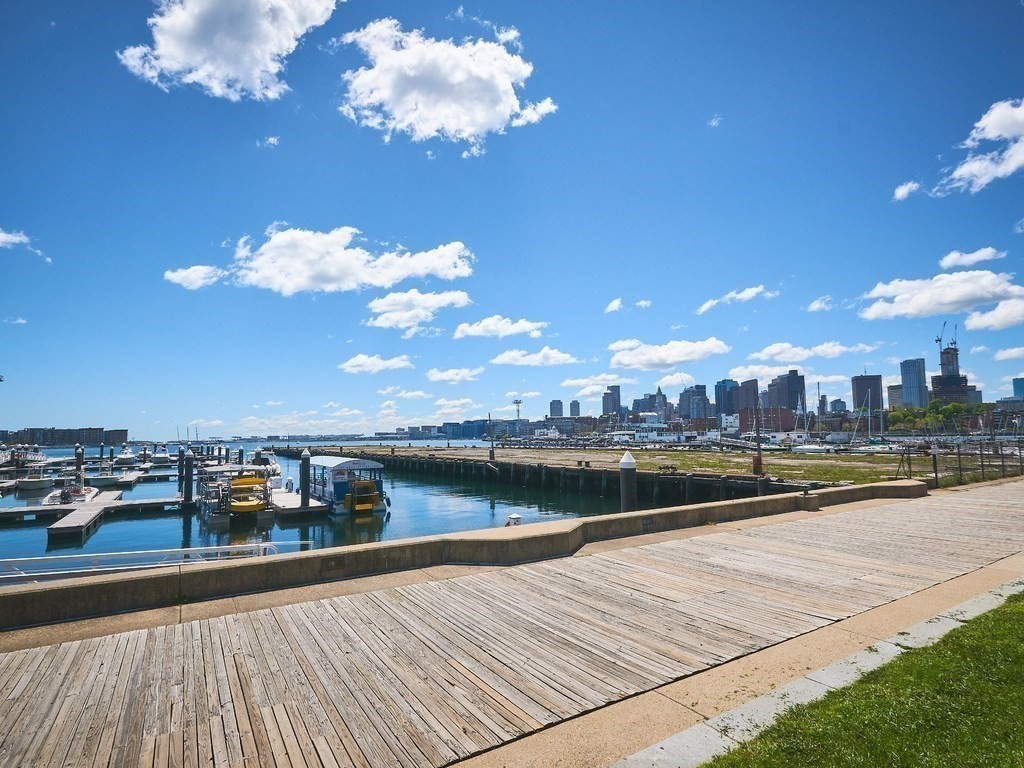 42 8th Street, Unit 5521 Boston, MA 02129 - Photo 23 of 25 a view of a lake with a terrace