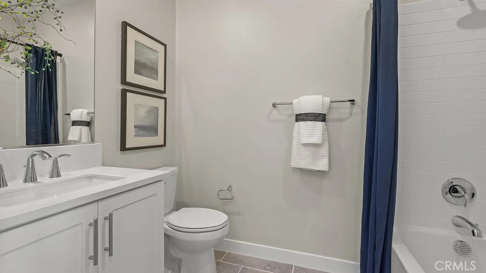 211 Bounty Road Rancho Mission Viejo, CA 92694 - Photo 17 of 28 a bathroom with a sink toilet and shower
