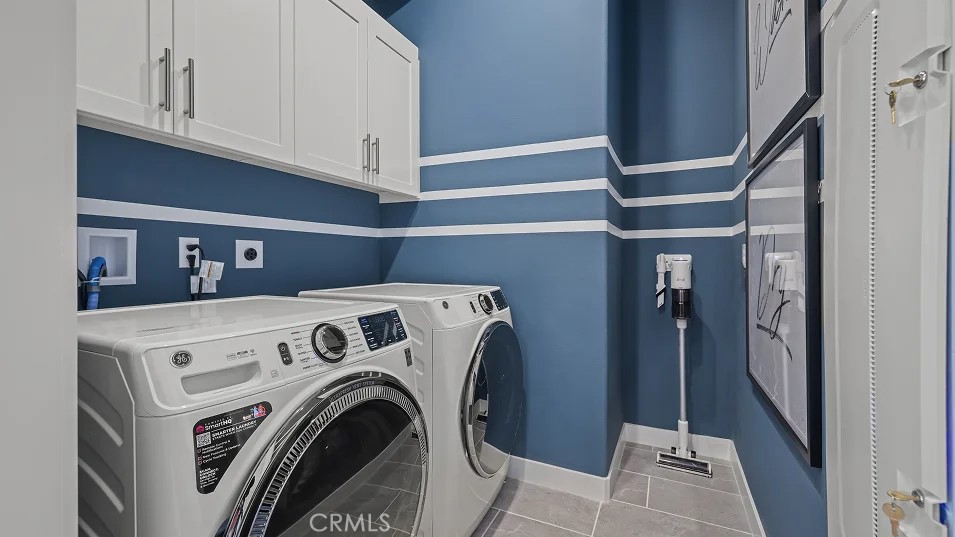 211 Bounty Road Rancho Mission Viejo, CA 92694 - Photo 18 of 28 a view of entryway with washer and dryer