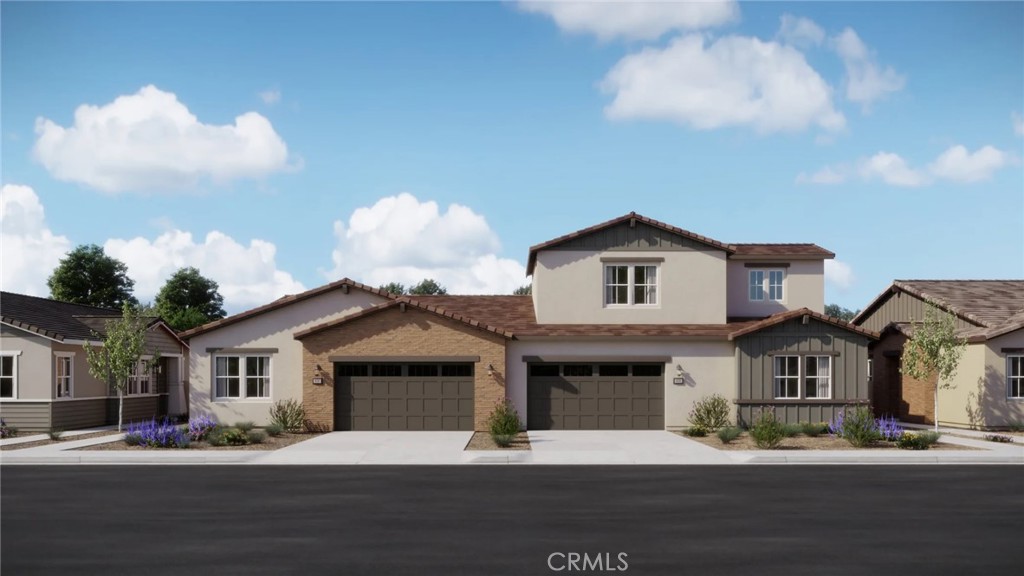 211 Bounty Road Rancho Mission Viejo, CA 92694 - Photo 19 of 28 a front view of a house with a road
