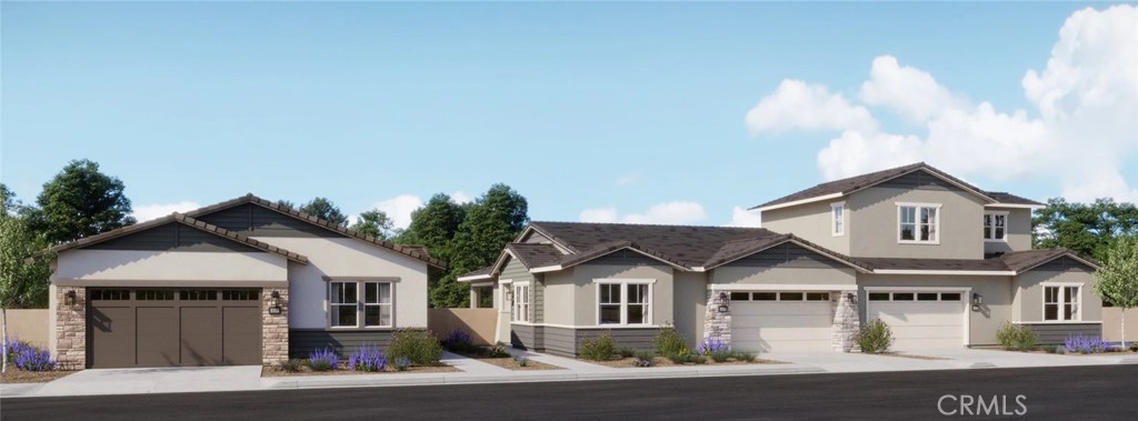 211 Bounty Road Rancho Mission Viejo, CA 92694 - Photo 20 of 28 a front view of a house with a yard and garage