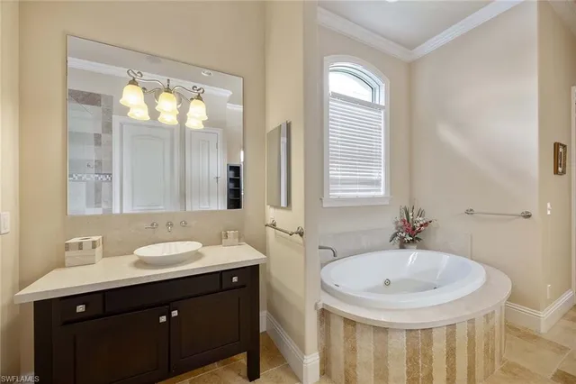 a bathroom with 2 sink and a mirror