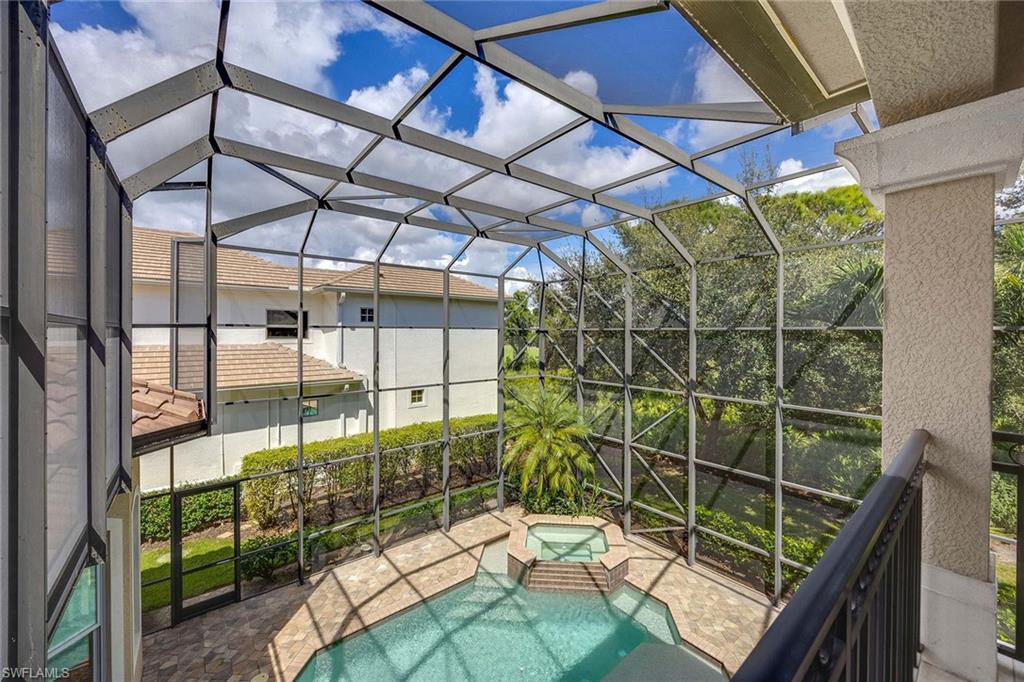 23801 Napoli Way Estero, FL 34134 - Photo 39 of 50 a view of a room with wooden floor