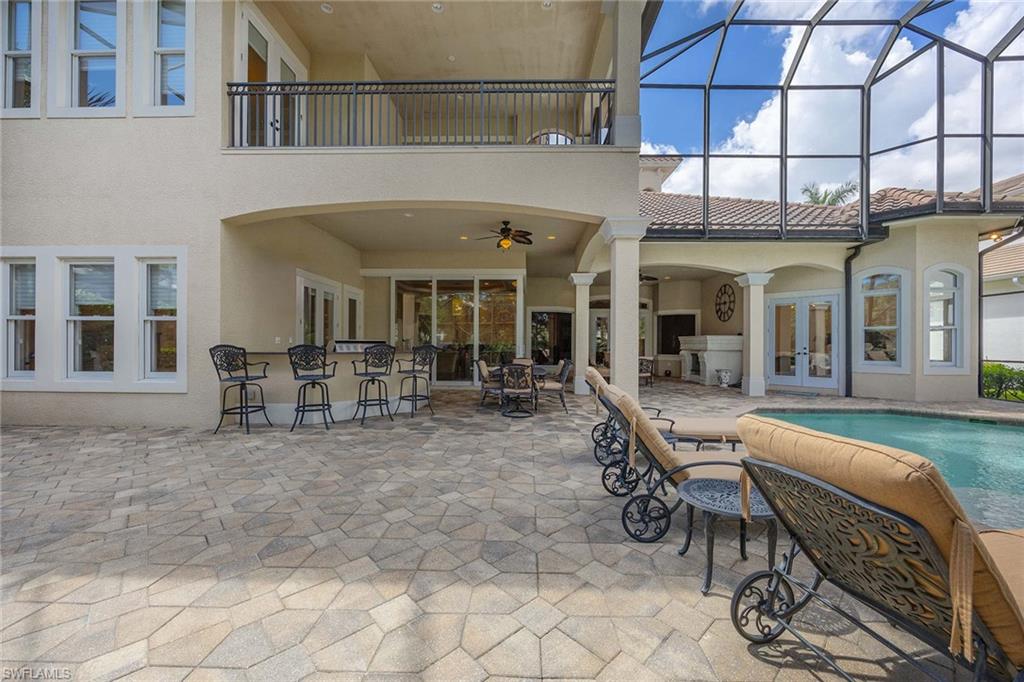 23801 Napoli Way Estero, FL 34134 - Photo 43 of 50 a view of a dinning room and livingroom with furniture