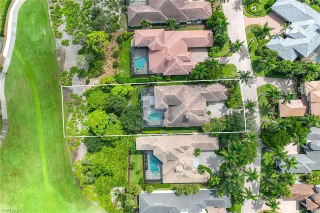 a view of a swimming pool with a garden