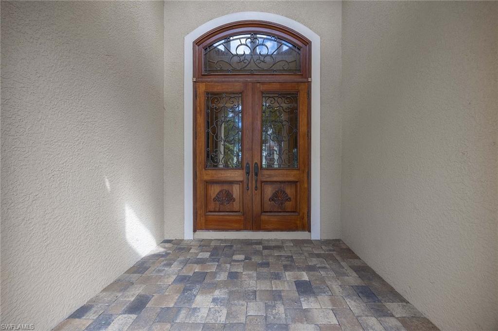 23801 Napoli Way Estero, FL 34134 - Photo 7 of 50 a view of an entryway door