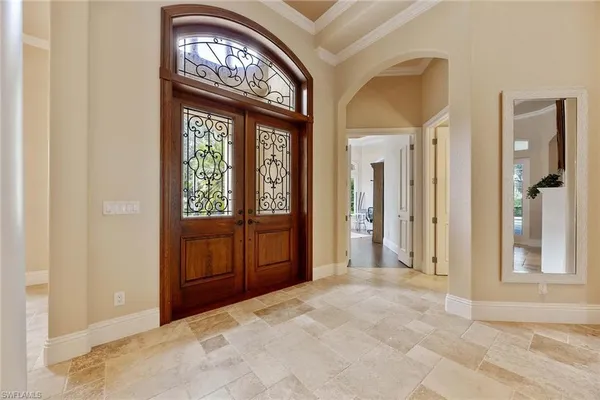 a view of an entryway with a front door