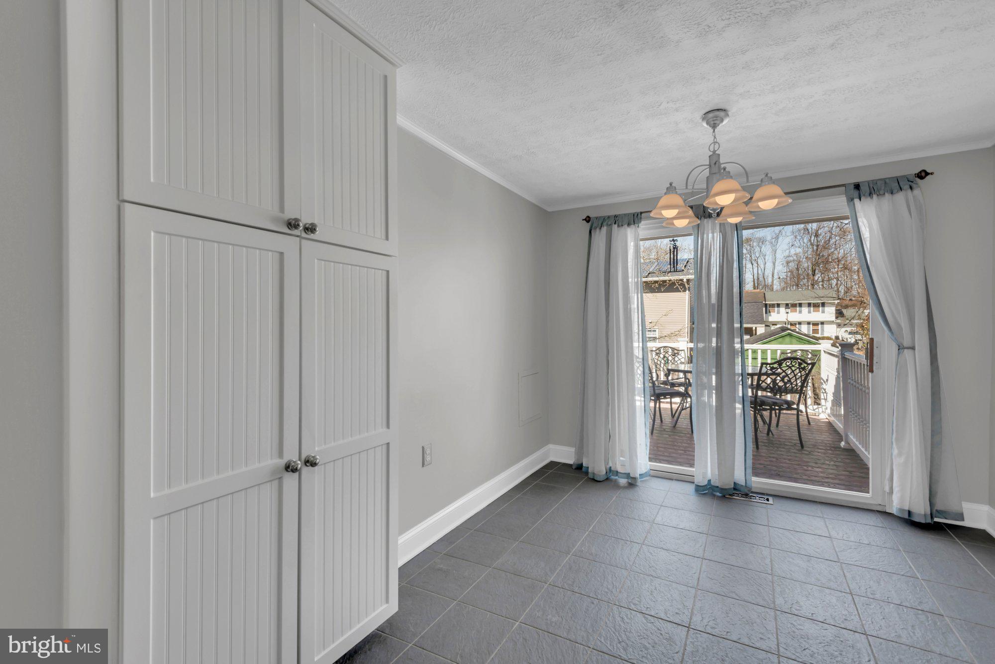 2513 Maytime Drive Gambrills, MD 21054 - Photo 11 of 40 a view of a room with window and chandelier