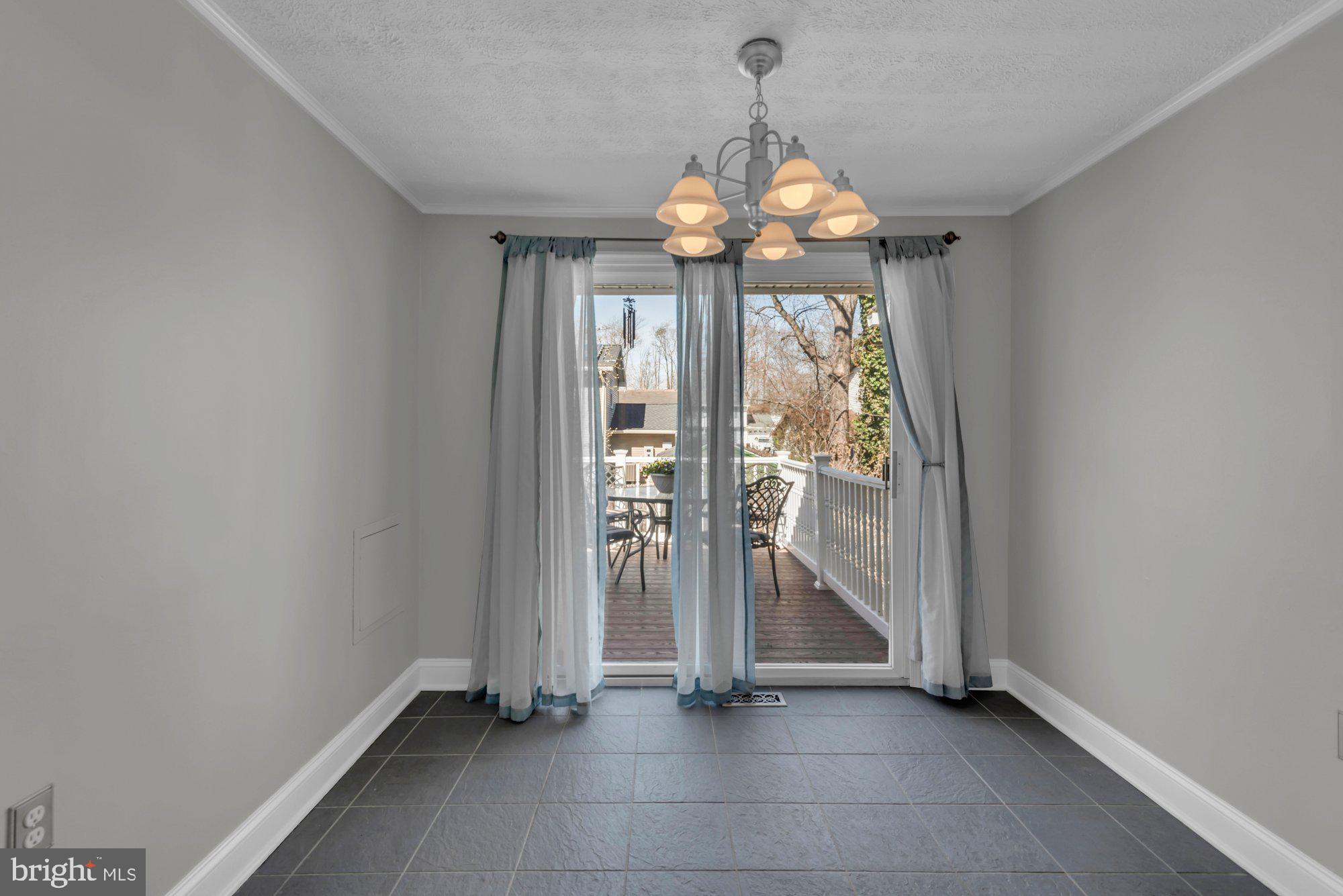 2513 Maytime Drive Gambrills, MD 21054 - Photo 12 of 40 a view of a room with chandelier entryway