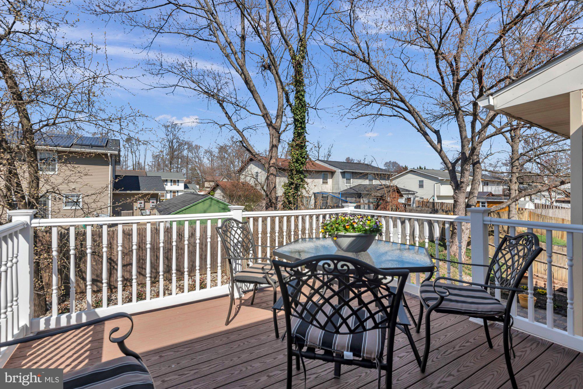 2513 Maytime Drive Gambrills, MD 21054 - Photo 14 of 40 a view of a chairs and table on the deck