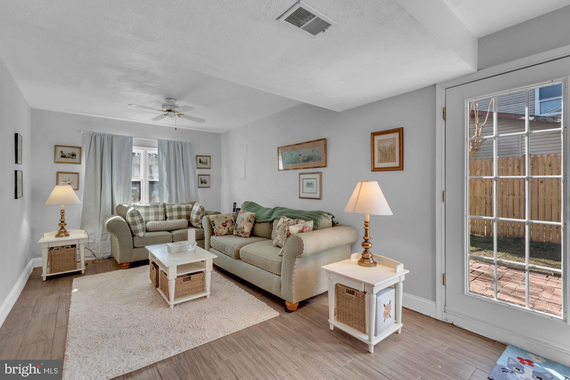 2513 Maytime Drive Gambrills, MD 21054 - Photo 23 of 40 a living room with furniture and a window