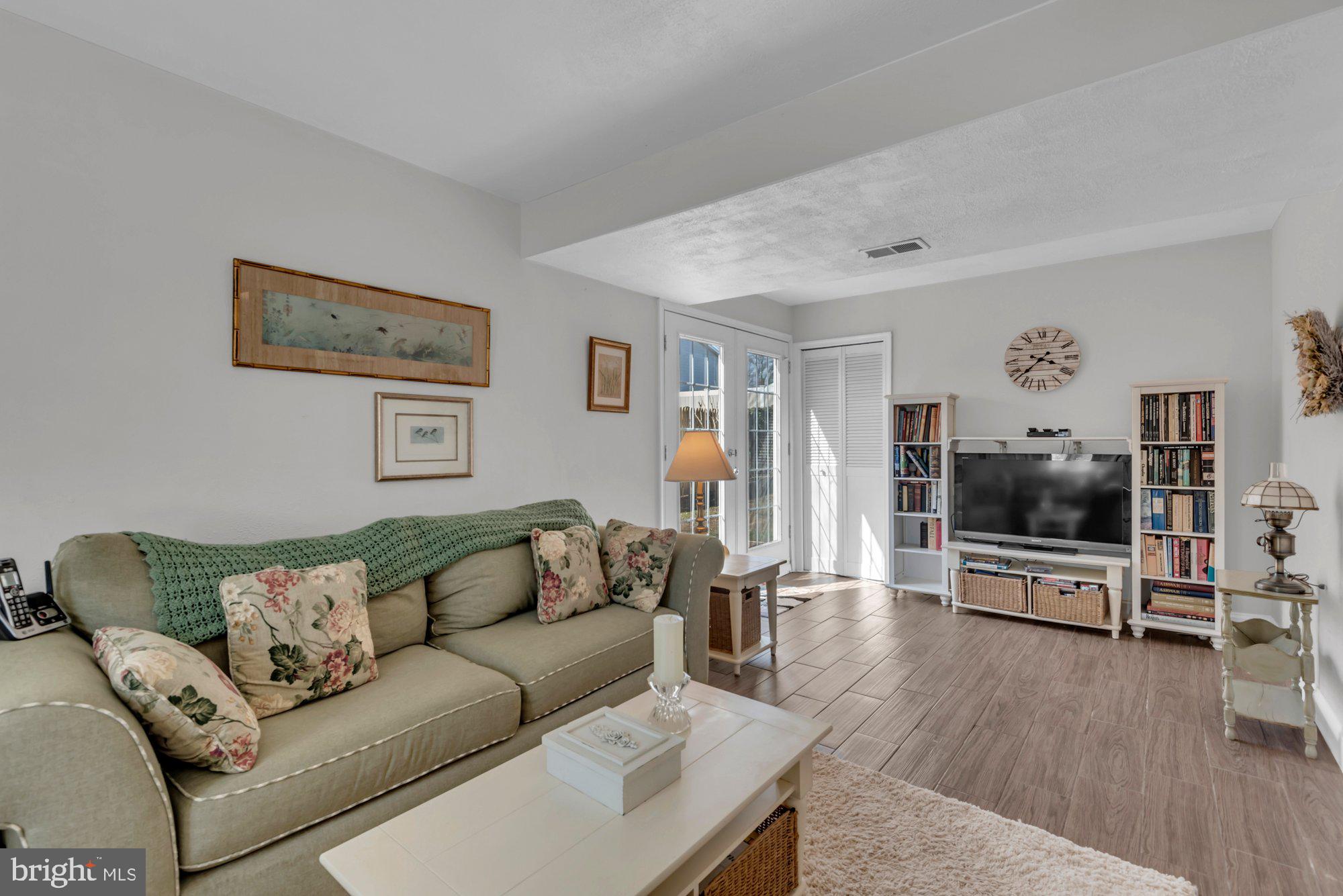2513 Maytime Drive Gambrills, MD 21054 - Photo 24 of 40 a living room with furniture and a flat screen tv