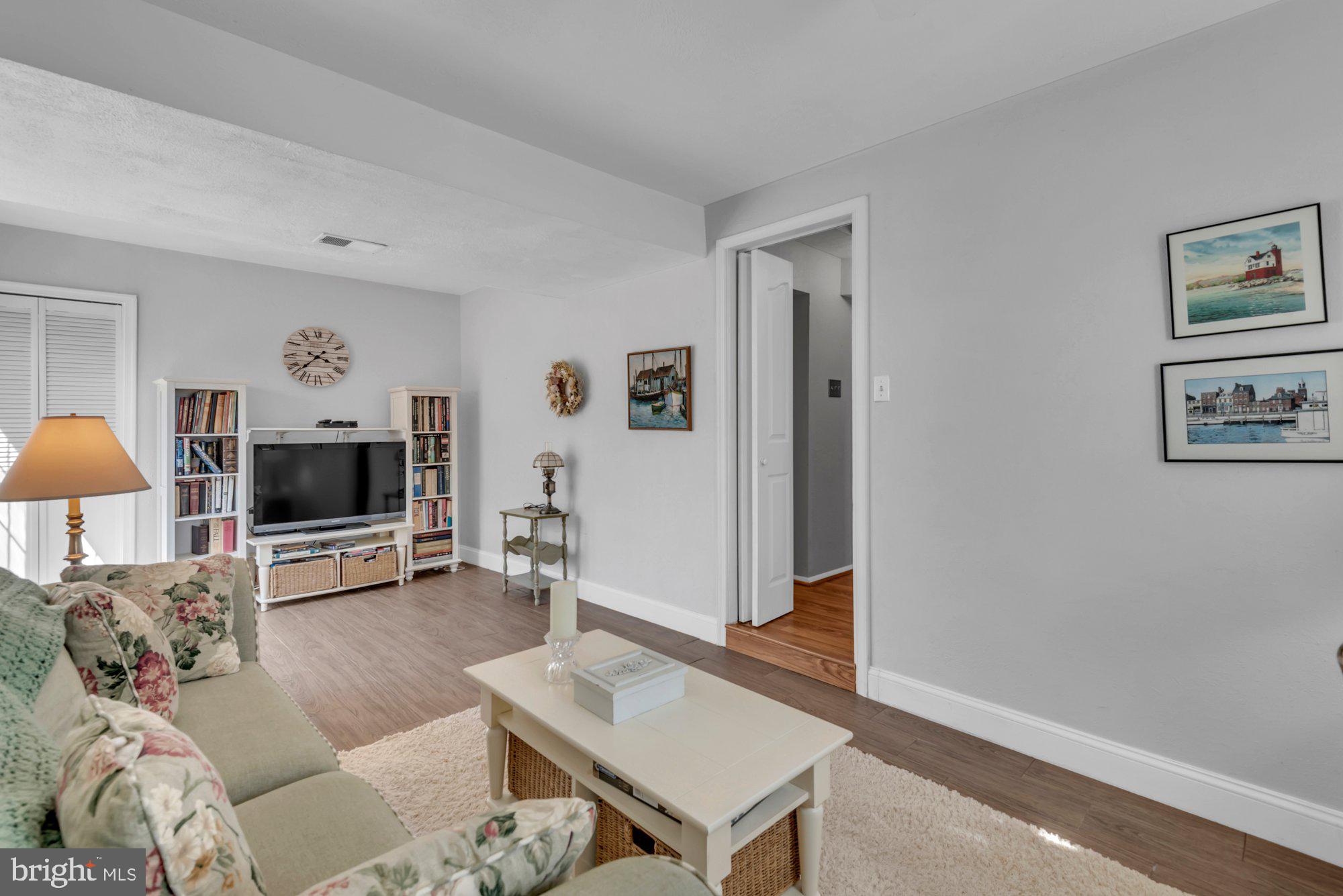 2513 Maytime Drive Gambrills, MD 21054 - Photo 25 of 40 a living room with furniture and a flat screen tv
