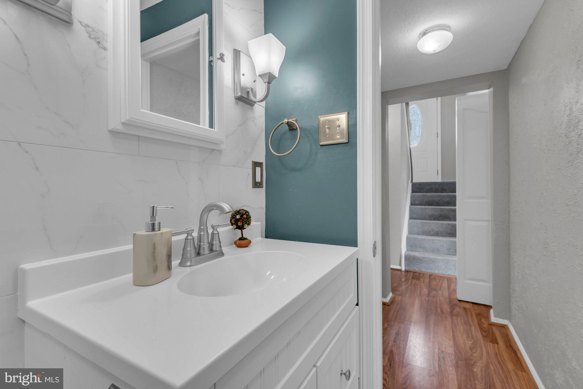 2513 Maytime Drive Gambrills, MD 21054 - Photo 28 of 40 a kitchen with a sink and a refrigerator