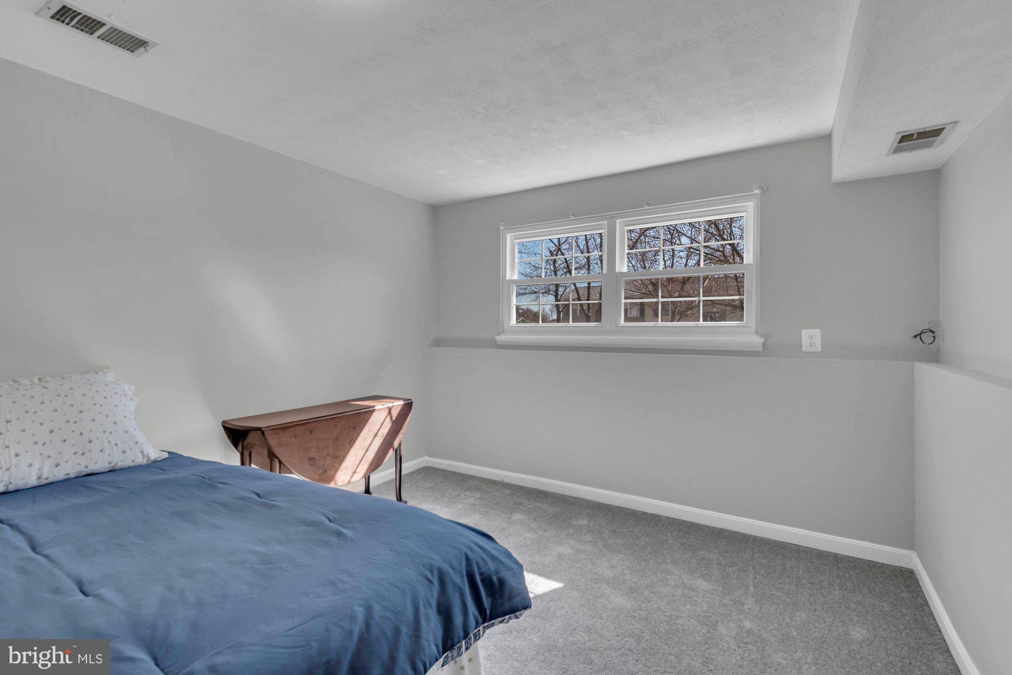 2513 Maytime Drive Gambrills, MD 21054 - Photo 34 of 40 a bedroom with a bed and a window