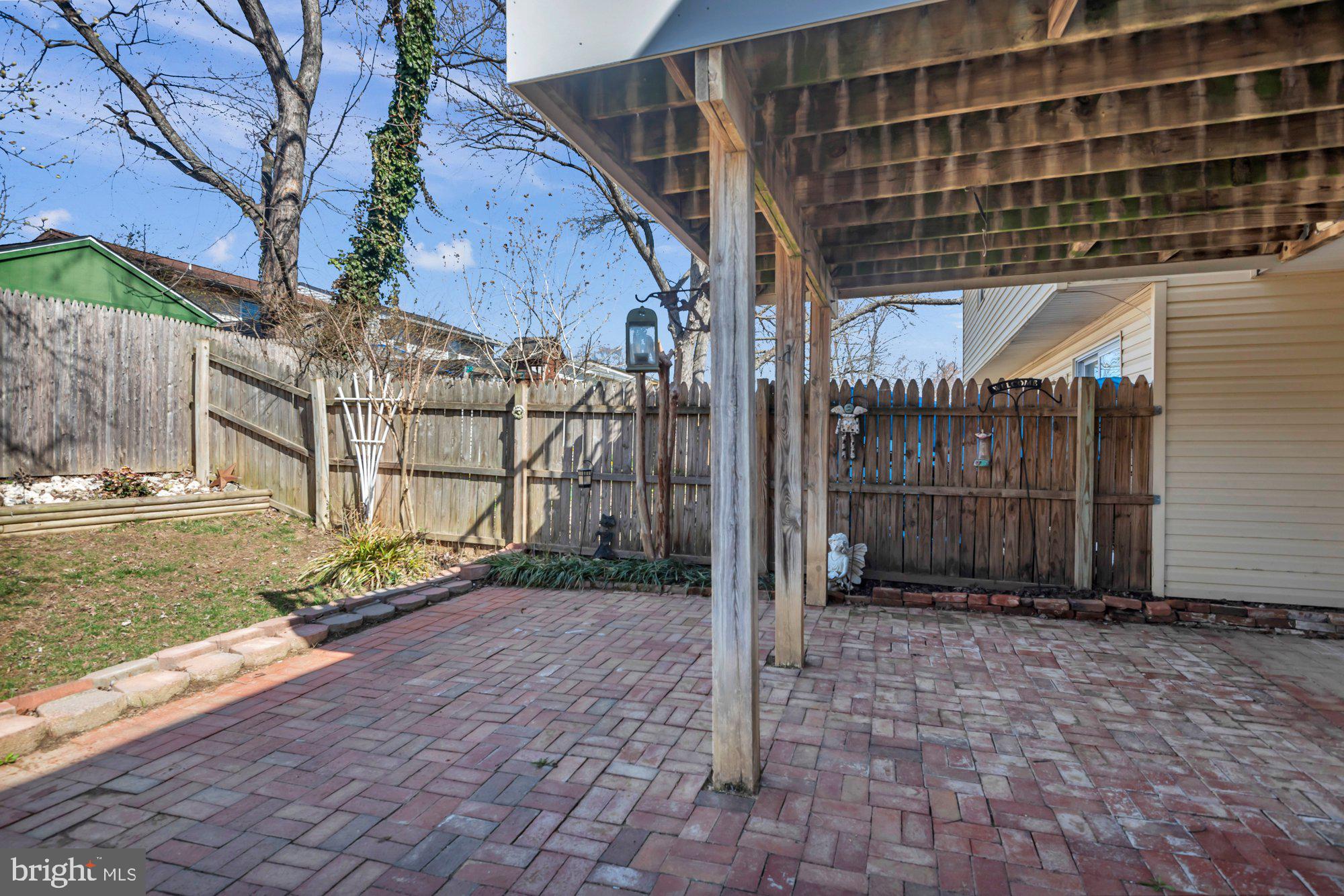 2513 Maytime Drive Gambrills, MD 21054 - Photo 36 of 40 a view of a wooden door with a yard