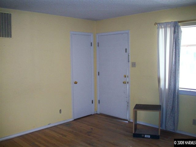 3270 Heights Reno, NV 89503 - Photo 9 of 9 an empty room with wooden floor and windows