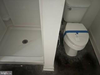 917 North Port Street Baltimore, MD 21205 - Photo 12 of 14 a bathroom with a toilet and a shower