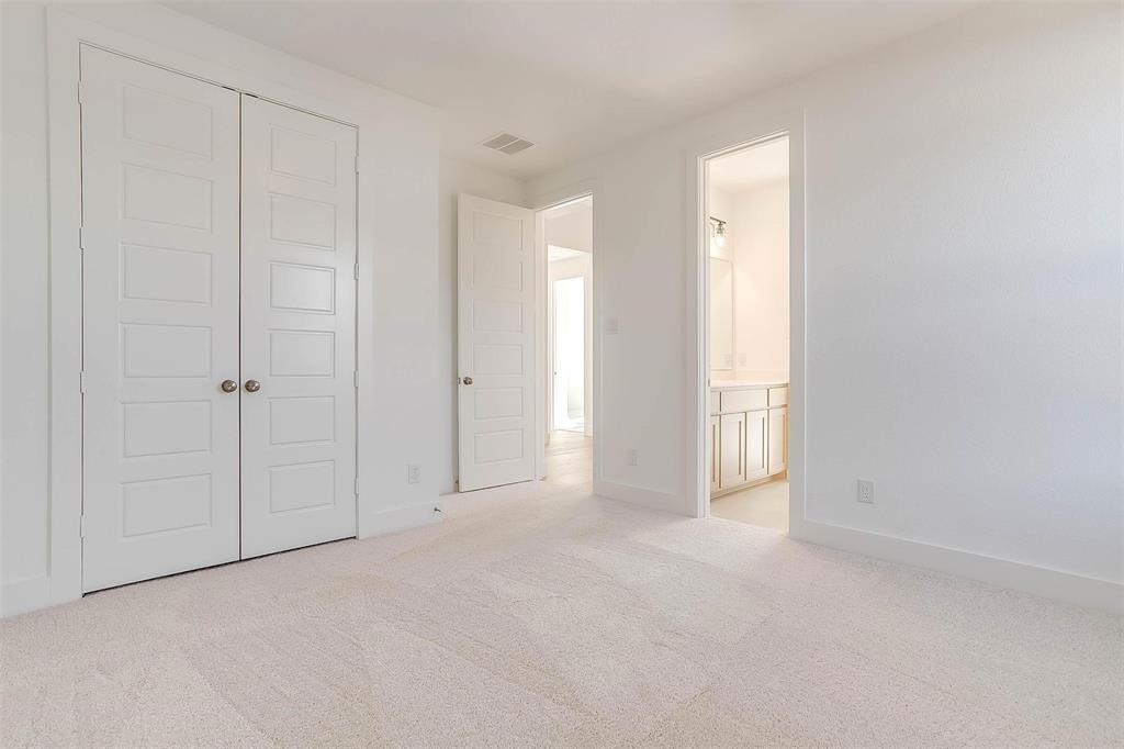 826 Feathergrass Place Haslet, TX 76052 - Photo 26 of 35 a view of an empty room and closet area