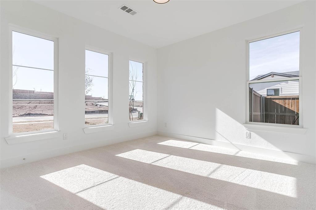 826 Feathergrass Place Haslet, TX 76052 - Photo 31 of 35 a view of an empty room with a window