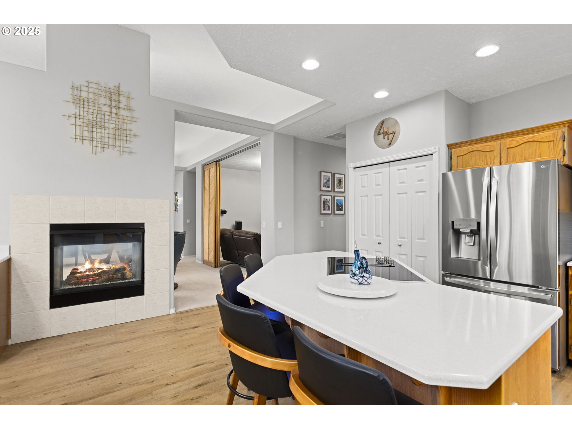 1249 Southeast Williams Avenue Gresham, OR 97080 - Photo 17 of 38 a kitchen with a table chairs and a refrigerator